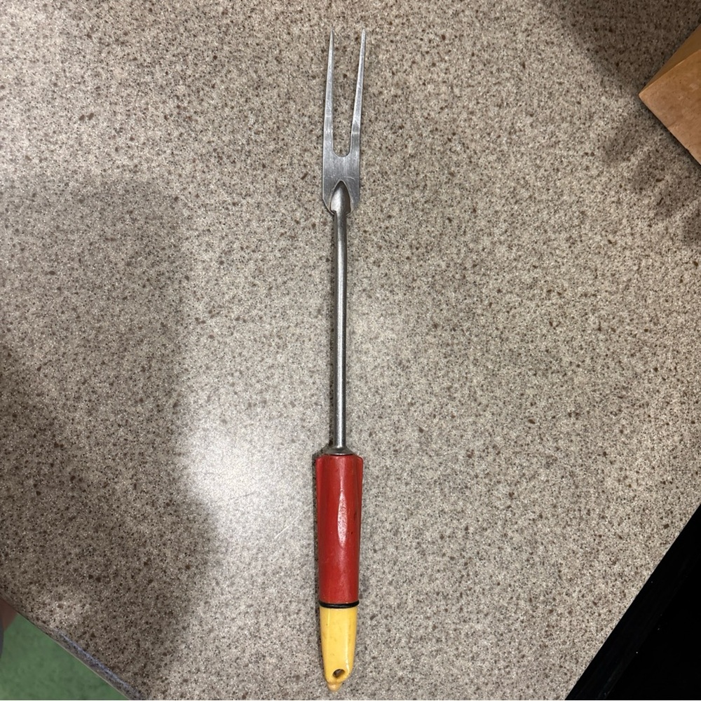 Red and Yellow Vintage Kitchen Fork